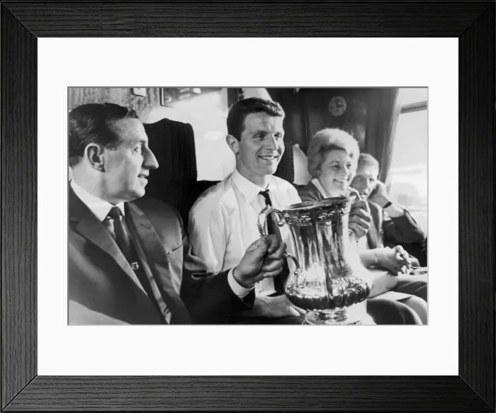 Framed Print : Everton manager Harry Catterick holds the FA Cup trophy on the train journey back to Framed Print : Everton manager Harry Catterick holds the FA Cup trophy on the train journey back to