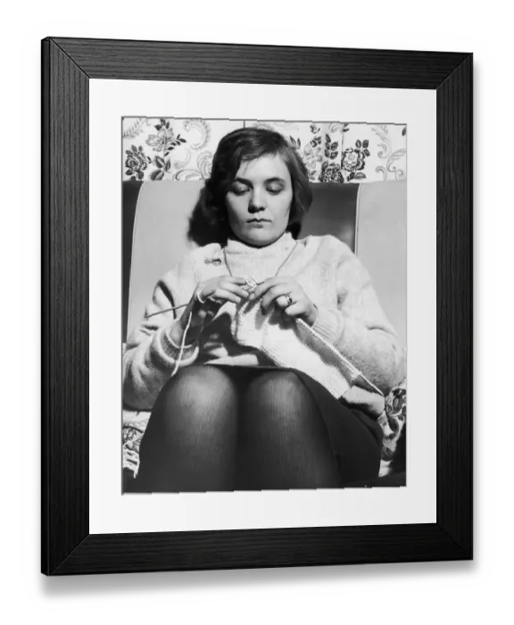 Framed Print : Woman seen here knitting a jumper circa 1965 Framed Print : Woman seen here knitting a jumper circa 1965