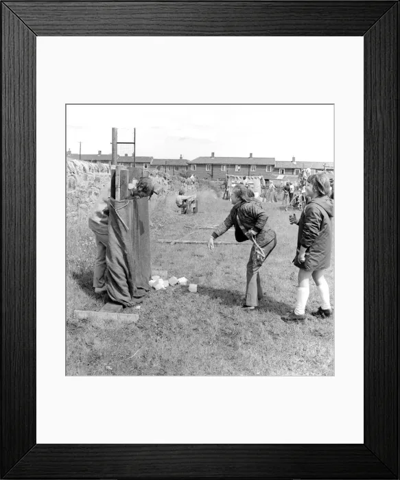 Framed Print : The residents of the West End of Newcastle playing old English games at the Denton Burn Framed Print : The residents of the West End of Newcastle playing old English games at the Denton Burn
