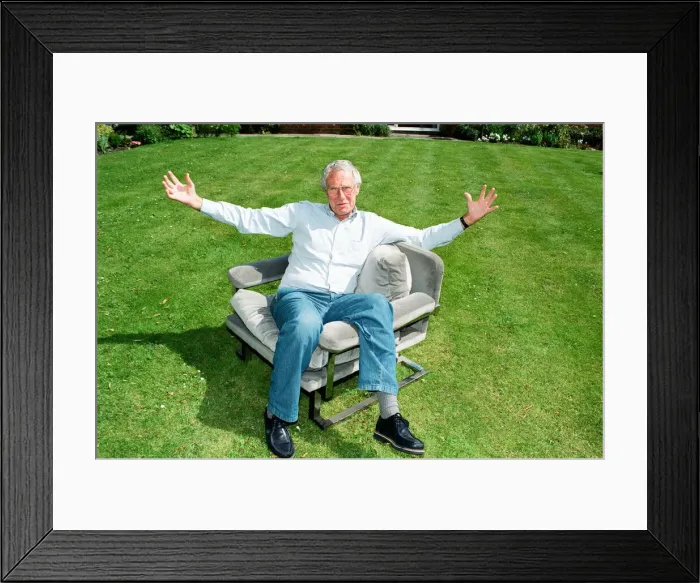 Framed Print : Barry Norman Film Critic seen here in the garden of his Datchworth home with the chair he Framed Print : Barry Norman Film Critic seen here in the garden of his Datchworth home with the chair he
