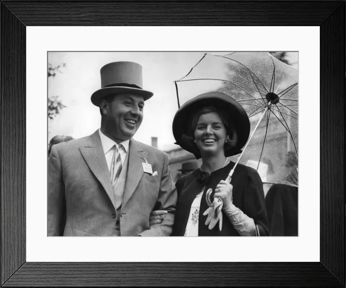 Framed Print : Mr. Doug Ellis, the Birmingham travel agent, and his wife at Ascot yesterday. Mrs Framed Print : Mr. Doug Ellis, the Birmingham travel agent, and his wife at Ascot yesterday. Mrs
