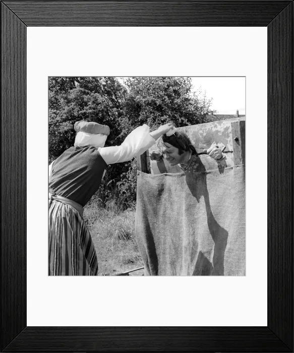 Framed Print : The residents of the West End of Newcastle playing old English games at the Denton Burn Framed Print : The residents of the West End of Newcastle playing old English games at the Denton Burn