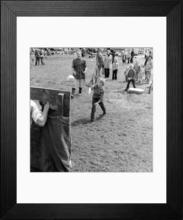 Framed Print : The residents of the West End of Newcastle playing old English games at the Denton Burn