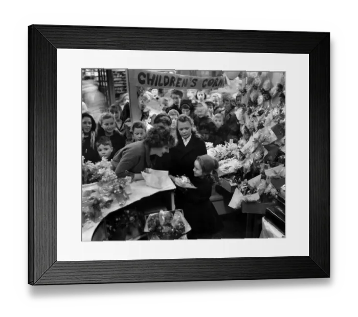 Framed Print : Children crowd a florists stall to buy thier flower for Mothering Sunday. 7th March 1959 Framed Print : Children crowd a florists stall to buy thier flower for Mothering Sunday. 7th March 1959