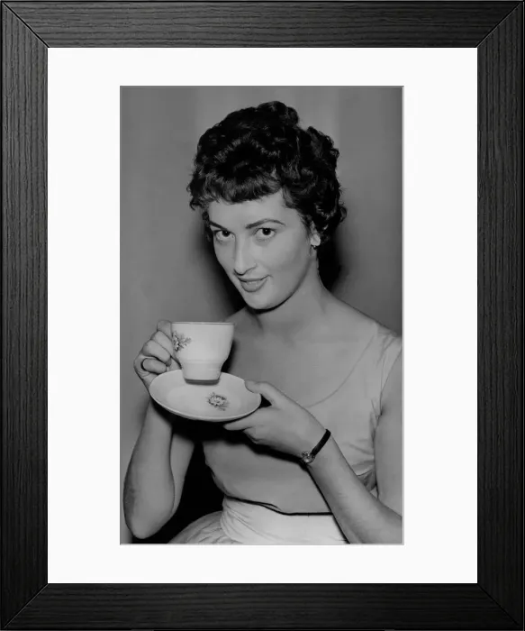 Framed Print : A model enjoying a cup of tea on 6th August 1959 for an Evening Chronicle tea feature Framed Print : A model enjoying a cup of tea on 6th August 1959 for an Evening Chronicle tea feature