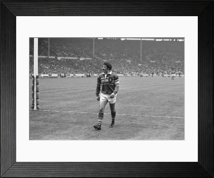 Framed Print : A lone Leeds player leaves the pitch dejected after his team lost 24 - 7 to Leigh in Framed Print : A lone Leeds player leaves the pitch dejected after his team lost 24 - 7 to Leigh in