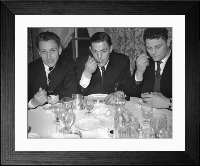 Framed Print : Three Halifax players seen here enjoying a meal on the eve of the Rugby League Challenge