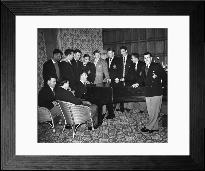 Framed Print : Halifax players seen here gathering the piano after enjoying a meal on the eve of Framed Print : Halifax players seen here gathering the piano after enjoying a meal on the eve of