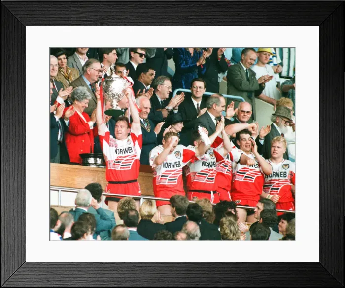 Framed Print : Wigan Captains holds a loft the Rugby League Cup for the 7th sucessive time after beating