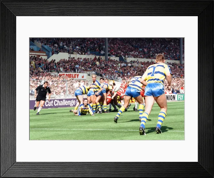 Framed Print : Warrington desperately clear their lines from deep within their own half during the Rugby Framed Print : Warrington desperately clear their lines from deep within their own half during the Rugby