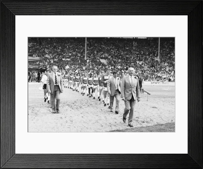 Framed Print : Widnes and Wigan walk out on to the pitch for the first time lead by their resceptive Framed Print : Widnes and Wigan walk out on to the pitch for the first time lead by their resceptive