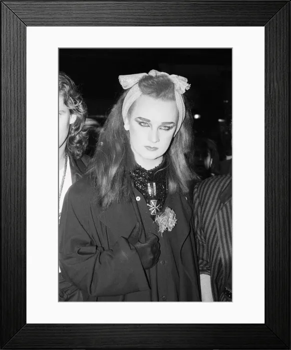 Framed Print : Culture Club singer Boy George arriving at a film premiere. 3rd October 1984 Framed Print : Culture Club singer Boy George arriving at a film premiere. 3rd October 1984