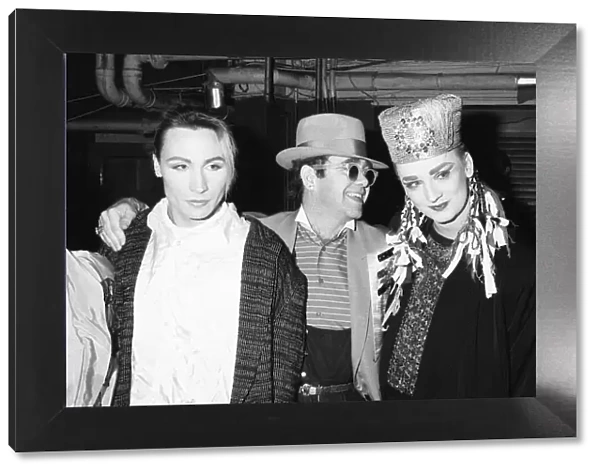 Singer Boy George with with friend Marilyn and Elton John during the Culture Club