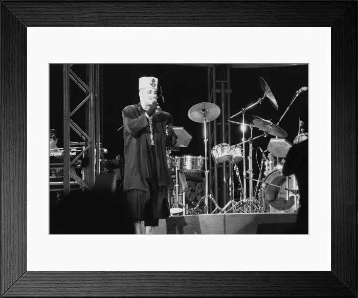 Framed Print : Culture Club singer Boy George performing on stage during a concert Framed Print : Culture Club singer Boy George performing on stage during a concert