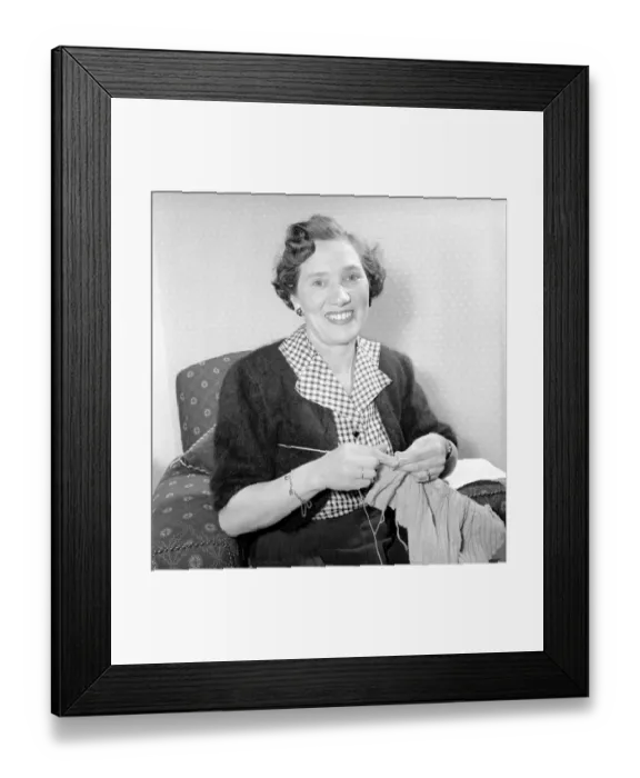 Framed Print : Woman at home knitting. Circa 1955 A119-003