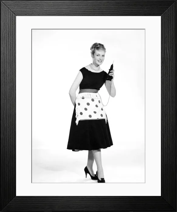 Framed Print : Model Roma Reeves seen here wearing green spot apron whislt knitting 1958 B944-002 Framed Print : Model Roma Reeves seen here wearing green spot apron whislt knitting 1958 B944-002
