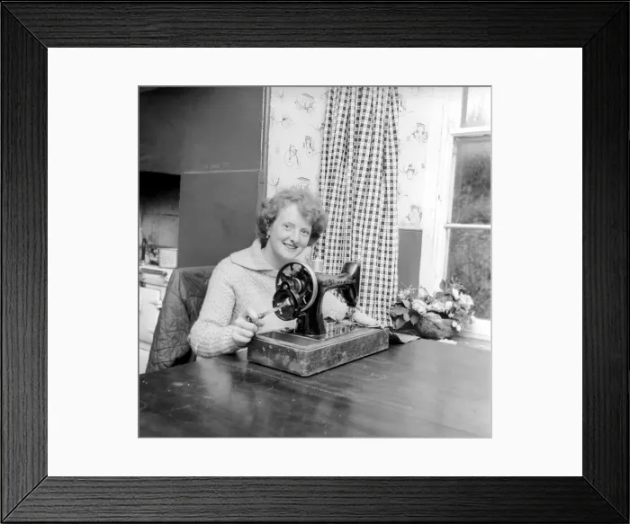 Framed Print : Woman using sewing machine. Circa 1964 A1137b-002 Framed Print : Woman using sewing machine. Circa 1964 A1137b-002