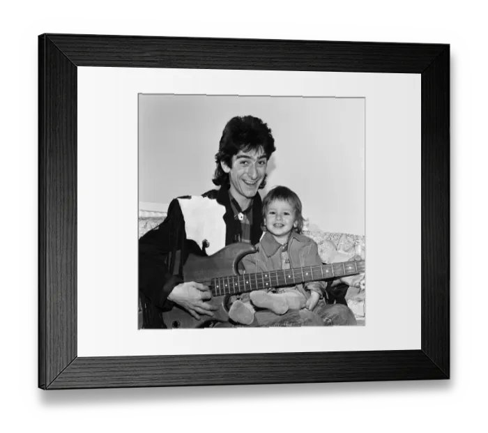 Framed Print : Gary Holton, Actor and son Red, pictured together at home in London, December 1984 Framed Print : Gary Holton, Actor and son Red, pictured together at home in London, December 1984