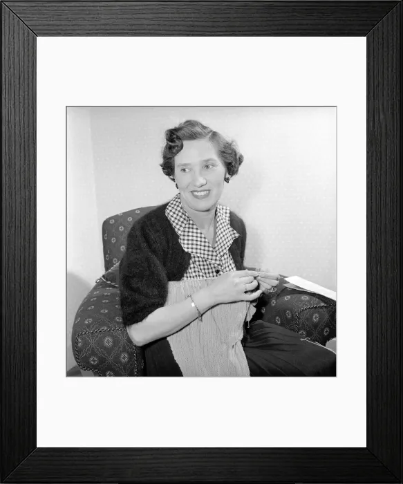 Framed Print : Woman at home knitting. Circa 1955 A119-003