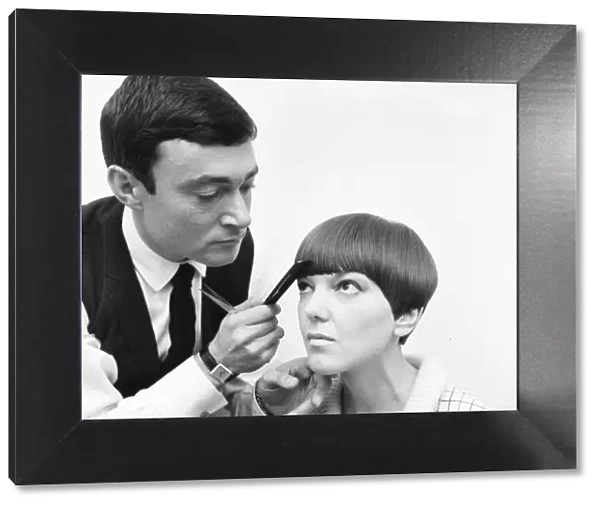 Fashion designer Mary Quant seen here having the finishing touches made to her new