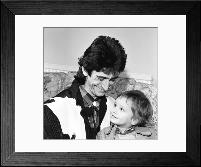 Framed Print : Gary Holton, Actor and son Red, pictured together at home in London, December 1984