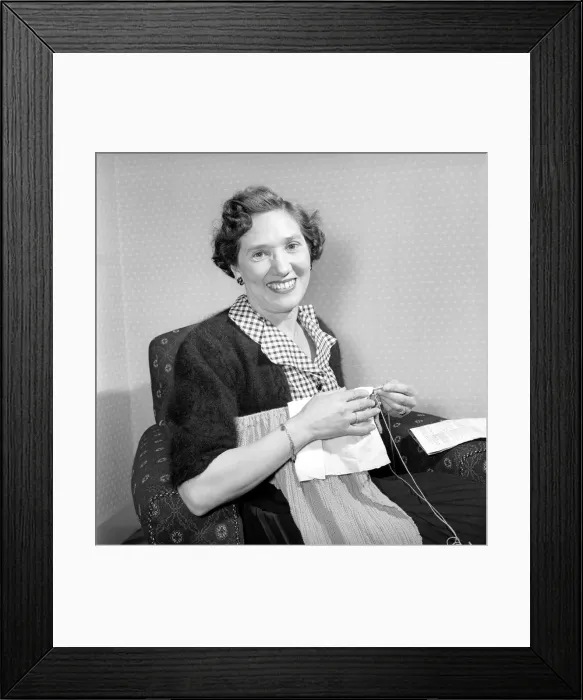 Framed Print : Woman at home knitting. Circa 1955 A119-003 Framed Print : Woman at home knitting. Circa 1955 A119-003
