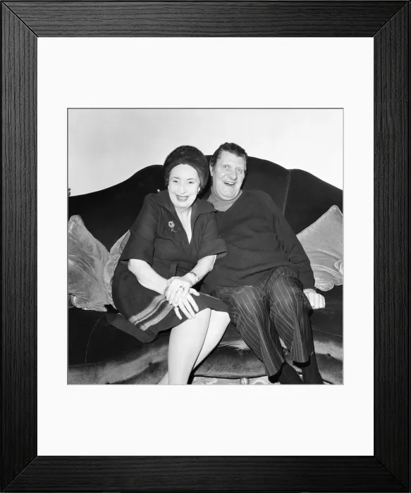 Framed Print : Tommy Cooper and wife Gwen, pictured together at home, February 1979 Framed Print : Tommy Cooper and wife Gwen, pictured together at home, February 1979