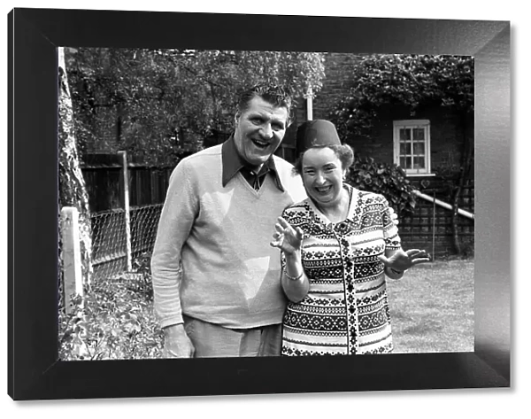 Tommy Cooper and wife Gwen, pictured together in garden of their home, May 1976