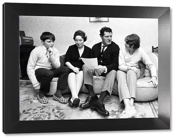 Tommy Cooper, pictured at home with family, wife Gwen, son Thomas and daughter Vicky