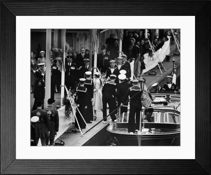 Framed Print : The Queen steps ashore from the Royal Barge at Wesminster Pier met by her family