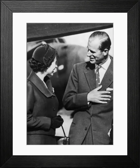 Framed Print : The Queen and The Duke of Edinburgh share a moment after being re-united for the first