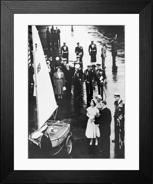 Framed Print : The Queen and The Duke of Edinburgh receiving the yacht presented to Prince Charles by Framed Print : The Queen and The Duke of Edinburgh receiving the yacht presented to Prince Charles by