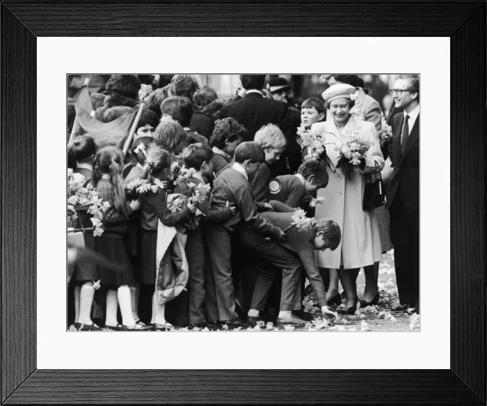 Framed Print : The Queens 60th Birthday, pictured outside the Palace collecting daffodils Framed Print : The Queens 60th Birthday, pictured outside the Palace collecting daffodils