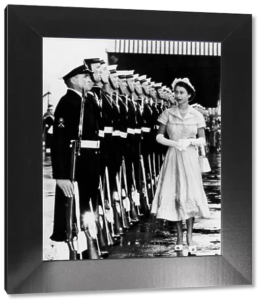 The Queen inspects a Naval guard of honour at Auckland, New Zealand