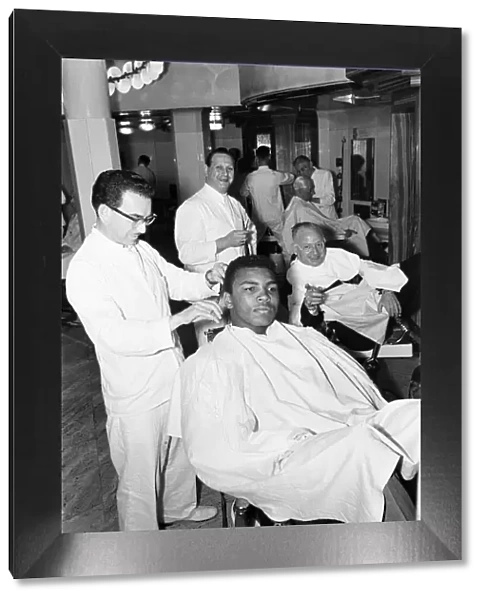 Cassius Clay (Muhammad Ali) seen here in the hairdressing salon of Austin Reeds in