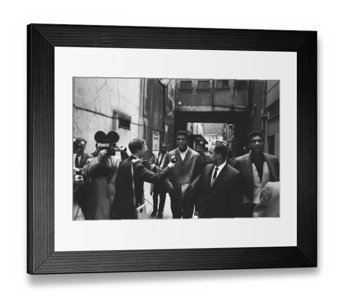 Framed Print : Cassius Clay (Muhammad Ali) seen here being interviewed by a BBC camera crew during a