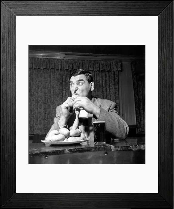 Framed Print : Sausage eating champion: Joe Steele of Bedlington Northumberland champion raw sausage