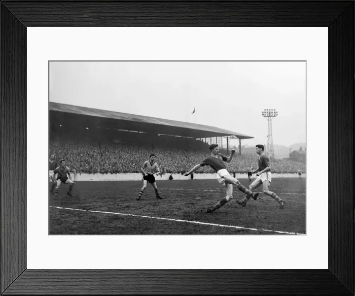 Framed Print : Leeds United vs. Wolverhampton Wanderers. Leeds centre half Jack Charlton clears