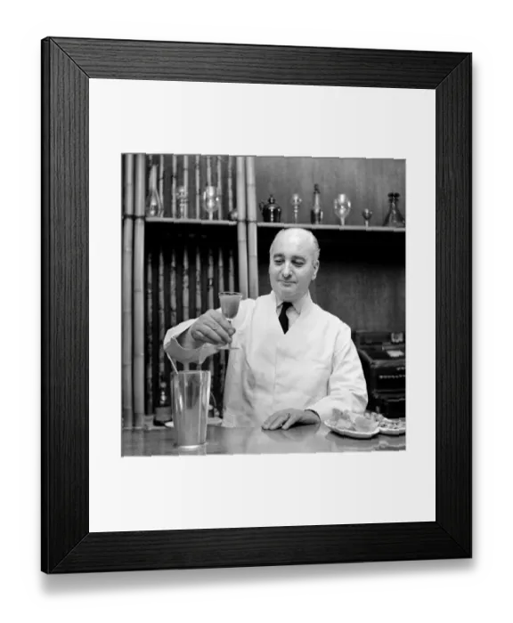 Framed Print : Joe Gilmore top barman at the Savoy hotel in London seen here preparing Cocktails. 1970