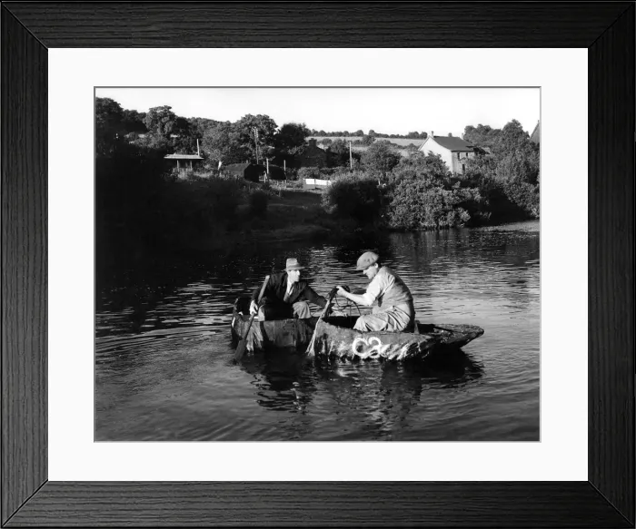 Framed Print : Coracle fisherman on the Teifii seen here with something in the net - and its heavy Framed Print : Coracle fisherman on the Teifii seen here with something in the net - and its heavy