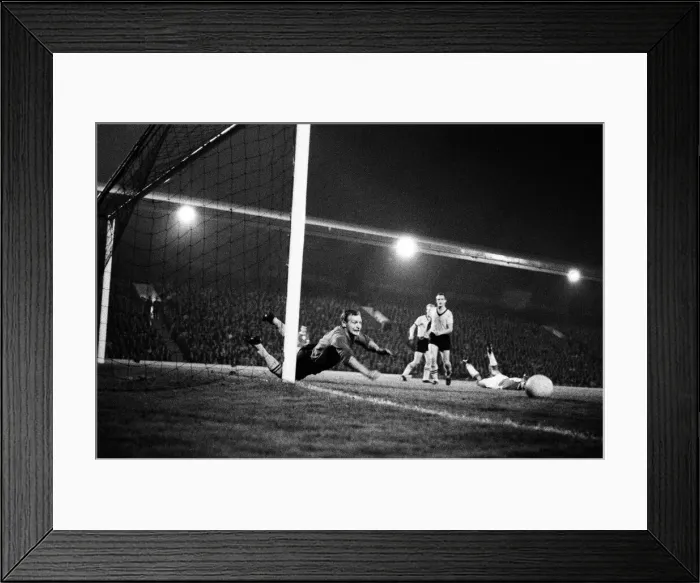 Framed Print : Wolves 1 V. Liverpool 3. First Division. Finlasson pushes a Roger Hunt shot past Framed Print : Wolves 1 V. Liverpool 3. First Division. Finlasson pushes a Roger Hunt shot past