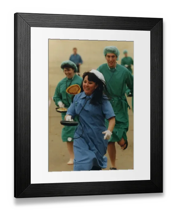 Framed Print : Medical staff take part in a Shrove Tuesday Pancake Race along the North East Coast line Framed Print : Medical staff take part in a Shrove Tuesday Pancake Race along the North East Coast line