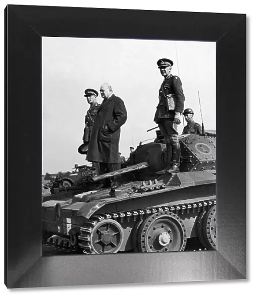 British Prime Minister Winston Churchill standing on a 'Covenanter'tank