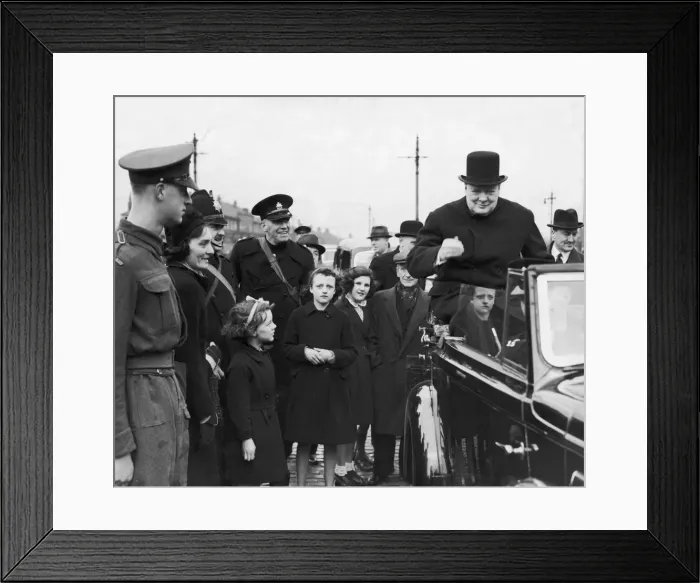 Framed Print : Prime Minister Winston Churchill sitting on the back of an open car on his surprise visit Framed Print : Prime Minister Winston Churchill sitting on the back of an open car on his surprise visit