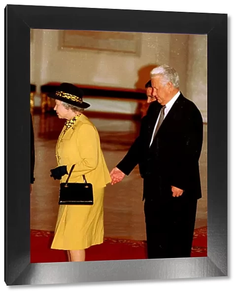 Queen Elizabeth with Boris Yeltsin standing behind at the Kremlin in Moscow