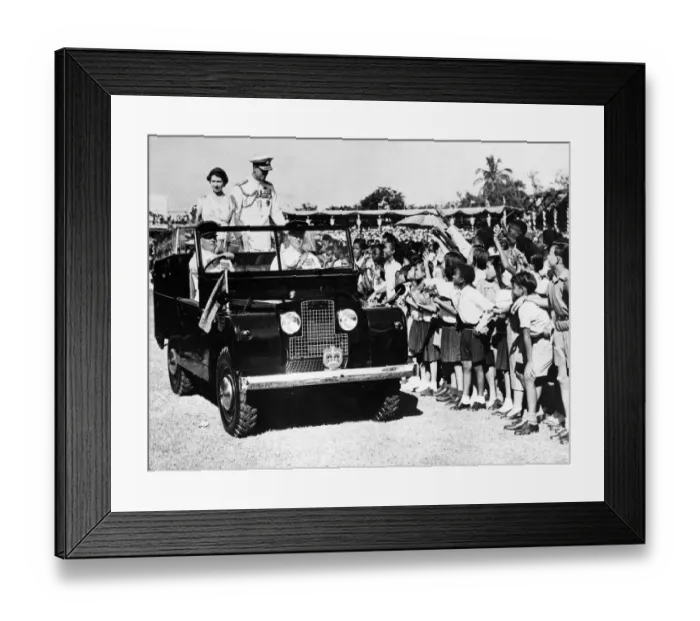 Framed Print : Queen Elizabeth II and Prince Philip smile at waving schoolchildren during heir visit to Framed Print : Queen Elizabeth II and Prince Philip smile at waving schoolchildren during heir visit to