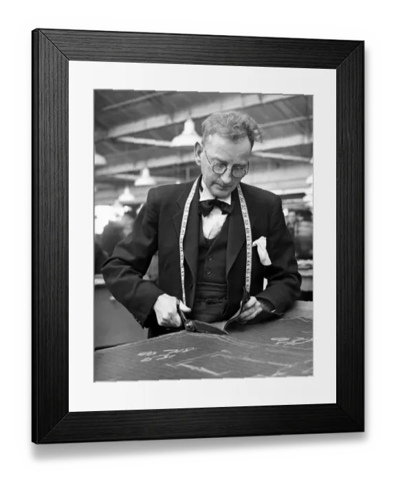 Framed Print : Tailor, busy at work in his workshop, 18th March 1947 Framed Print : Tailor, busy at work in his workshop, 18th March 1947