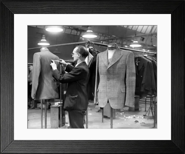 Framed Print : Tailor, busy at work in his workshop, 18th March 1947