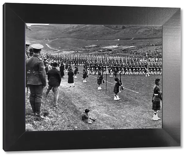 Prince of Wales inspects Seaforth Highlanders during a trooping of the colour ceremony at