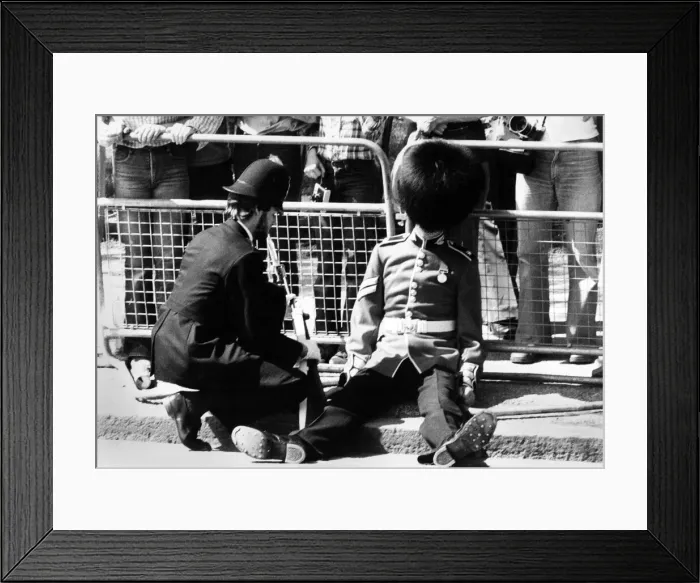 Framed Print : The scorching sun and that heavy bearskin leave this groggy Grenadier wilting on royal Framed Print : The scorching sun and that heavy bearskin leave this groggy Grenadier wilting on royal